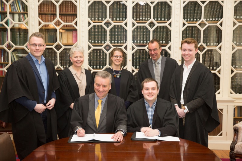 Provost, Dr Patrick Prendergast and TCDSU President, Kieran McNulty signing the Student Partnership Policy with (back row, from left) GSU President, Shane Collins, Patricia Callaghan, Academic Secretary, GSU Vice President, Elisa Crespo, Vice Provost/Chief Academic Office, Prof Chris Morash, and TCDSU Education Officer, Dale Whelehan