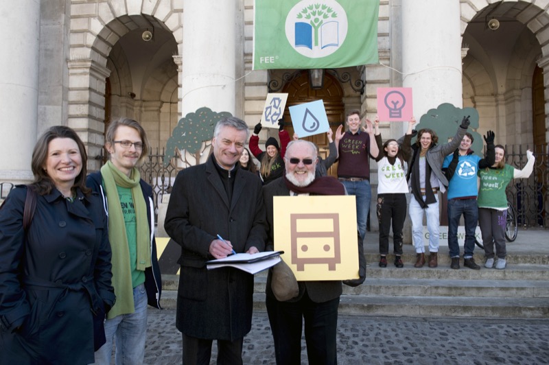 Pictured at the signing of the Charter (from left to right, foreground) are: Registrar, Professor Paula Murphy, Environment Officer, Student Union, Simon Benson, Provost, Dr Patrick Prendergast, and Senator, David Norris.