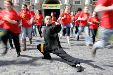TCD students and tai chi expert sam sun at the launch of health and sports week.