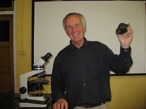 Dr ian sanders with a meteorite in tcd.