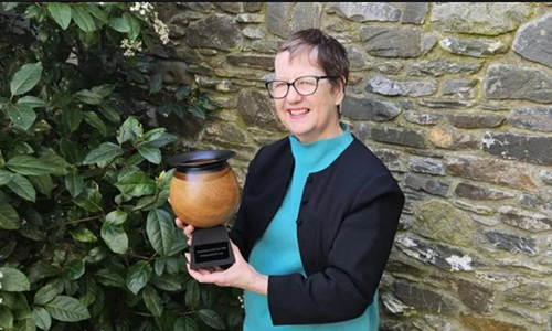 Professor Christine Casey with her IRC Legacy Researcher of the Year award 2024