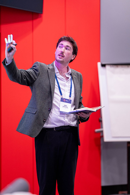 Trinity Laidlaw scholar Sean Radcliffe presenting at the Laidlaw Scholar Conference in London, 2026