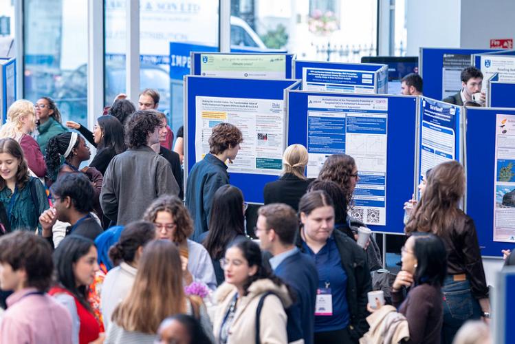 Trinity Laidlaw scholars reviewing research posters at the Laidlaw Scholar Conference in London, 2026
