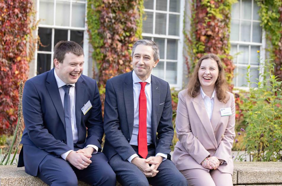 Simon Harris and graduates of TCPID