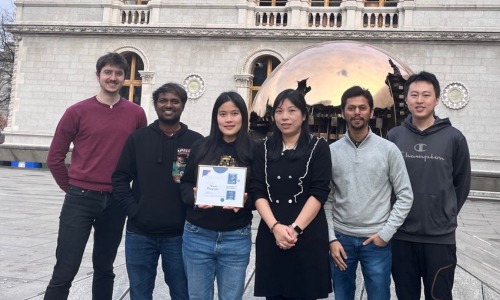 Six researchers from Trinity’s Schools of Engineering and Computer Science and Statistics  standing in front of the pomodoro with their winning certificate