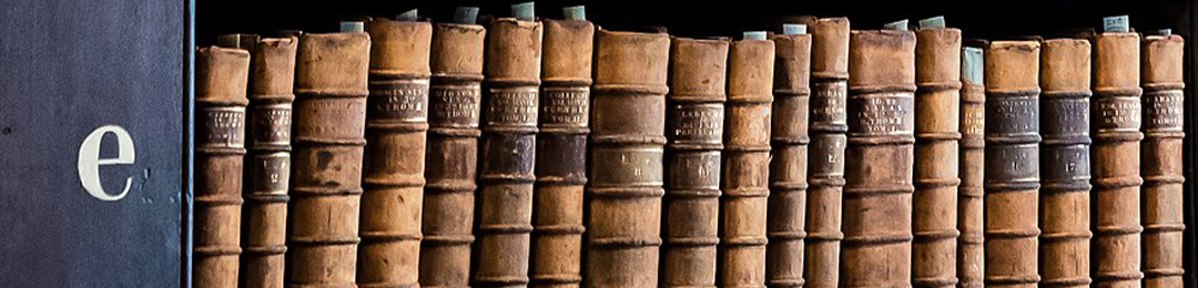 Old books on a library shelf