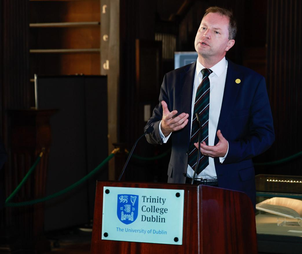 A man delivers a speech at a lectern