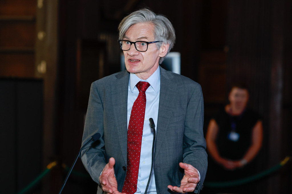 A man delivers a speech at a lectern