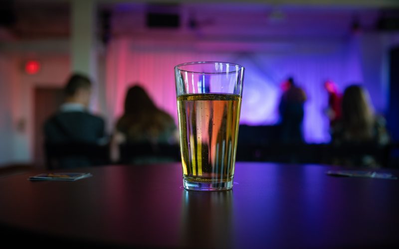 A pint of beer on a table