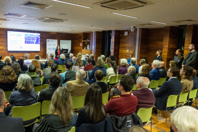 A seated audience in Trinity's Long Room Hub for the Opening Ceremony of Languages 250 at Trinity.