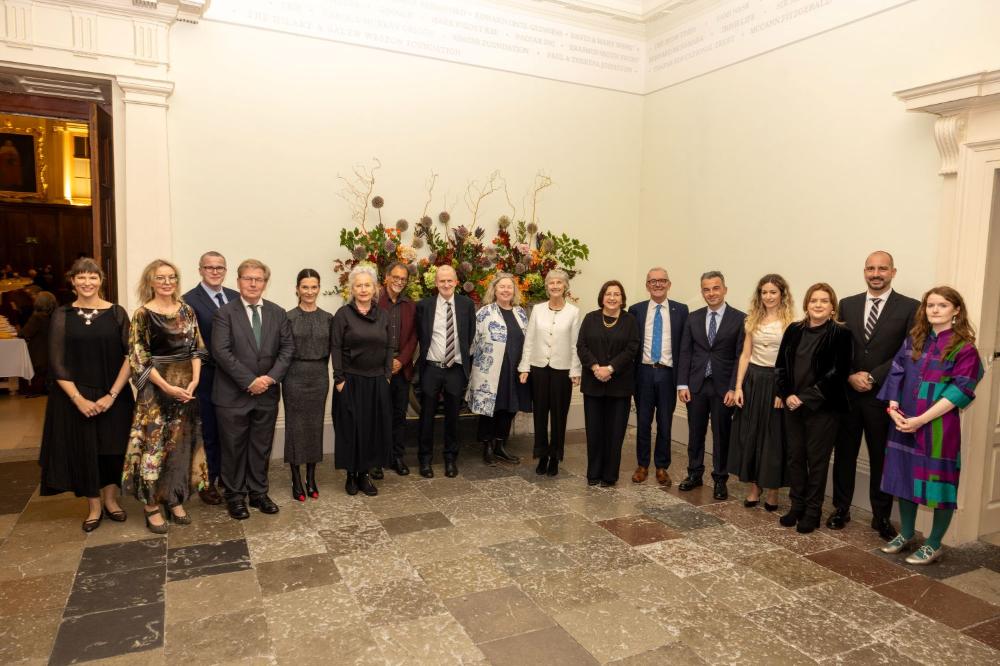 Colleagues from the School of Languages, Literatures and Cultural Studies with President Catherine Connolly in the Dining Hall of Trinity College Dublin.