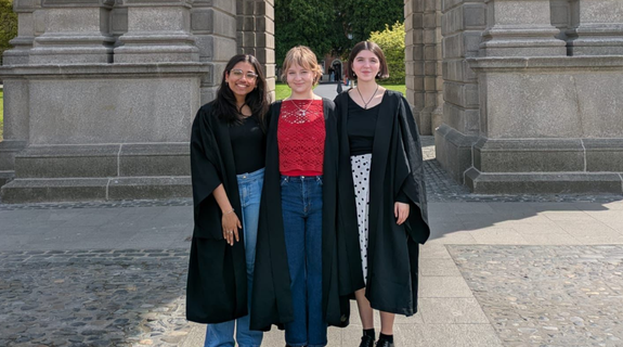 A group of three Trinity students on Trinity Monday.
