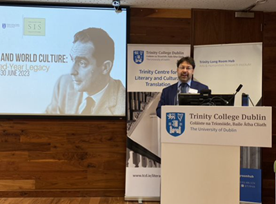 Marco Giochini speaking at a podium