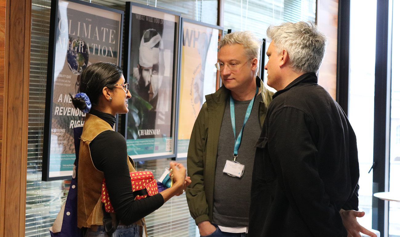 Fellows chatting at AH festival
