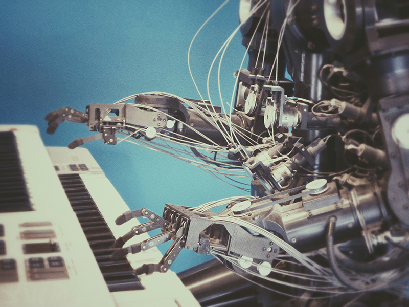 Image of robot playing piano