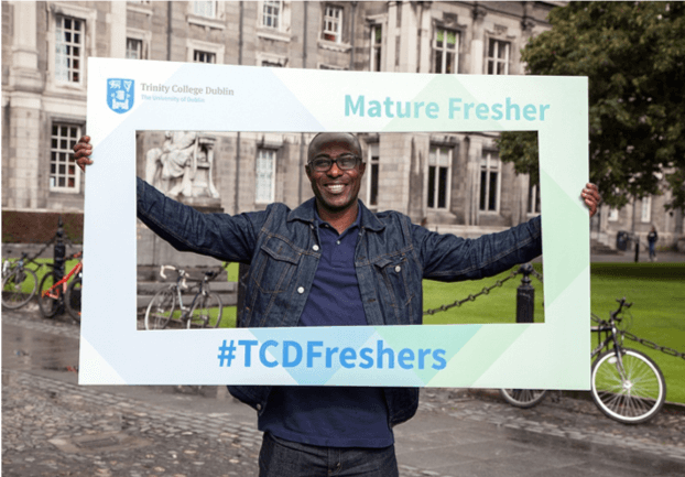 Mature Fresher Sign held up by a mature student