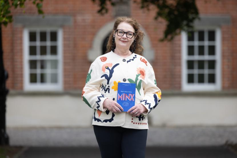 Picture of woman holding book