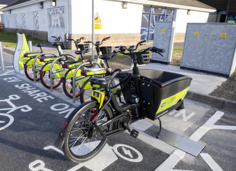 The e-bikes that were launched in Galway City, in a car park, with an ESB charging hub visible beside them.