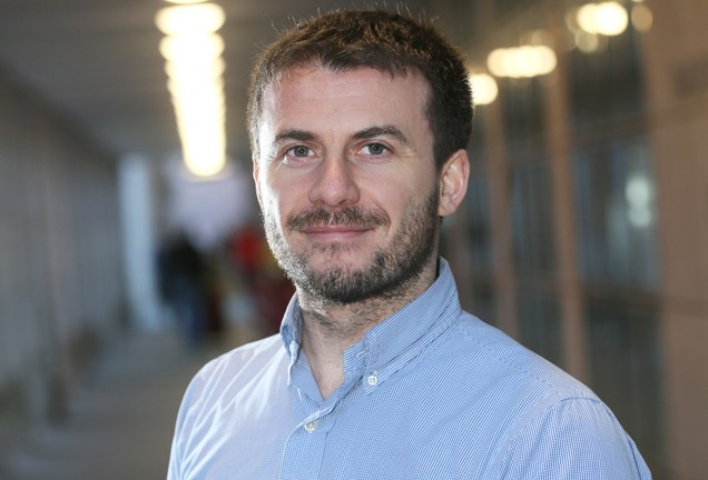 Prof. Adrian Bracken in a blue shirt