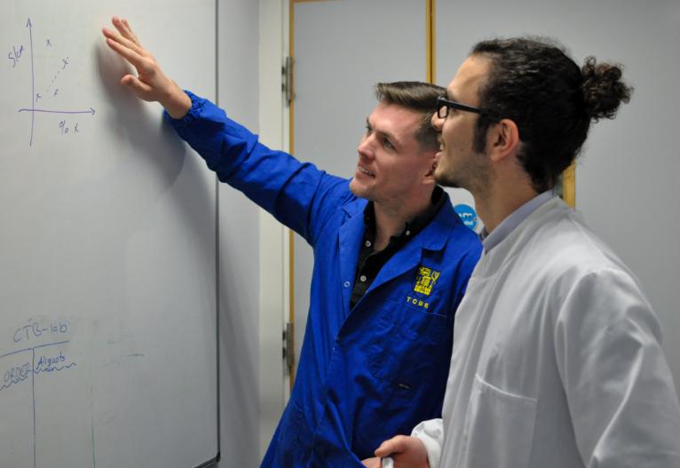 Professor Michael Monaghan with one of his team, discussing their new approach.