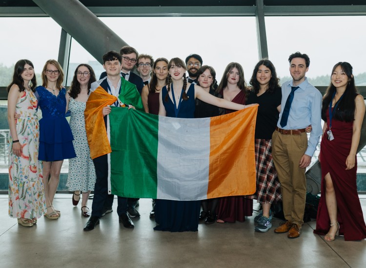 Students celebrating with Irish flag