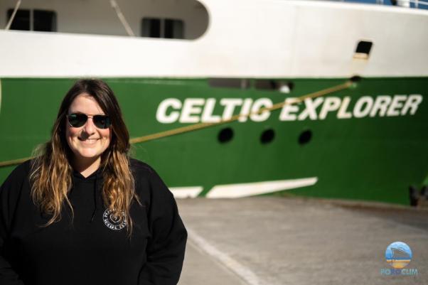 Erica Krueger, in front of a boat named Celtic Explorer