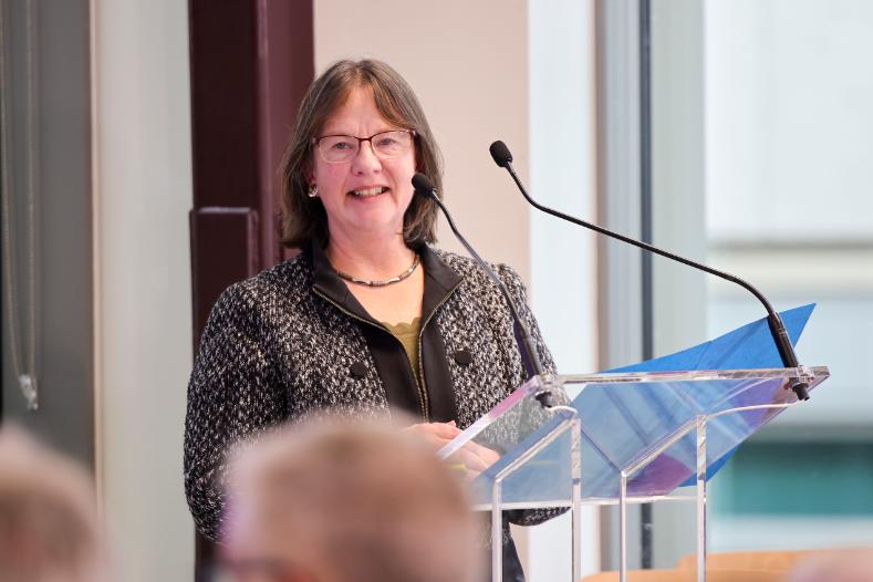 Woman at podium
