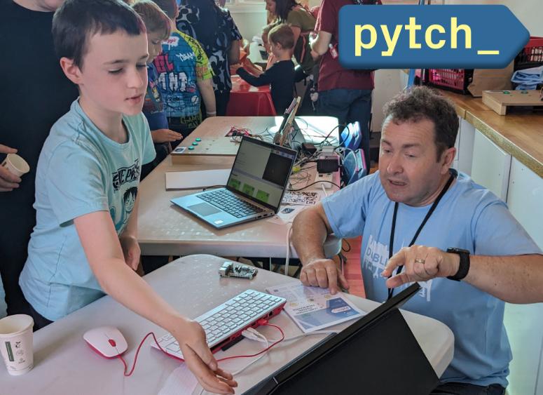 PI Prof. Glenn Strong in a blue T-Shirt, with a student at Dublin Maker, demoing Pitch
