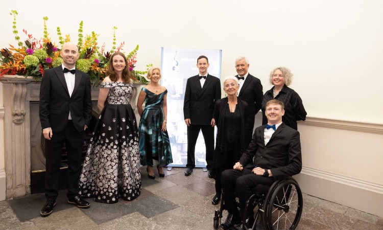 Eight recipients of Alumni awards with Provost Linda Doyle