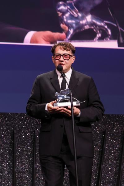Ilya Khrzhanovsky with the Silver Lion for Best Director for 'Dau' during the closing ceremony of the Venice International Film Festival 83. Photo by Ondine Goat. Licensed under the Creative Commons Attribution-Share Alike 4.0 International license.