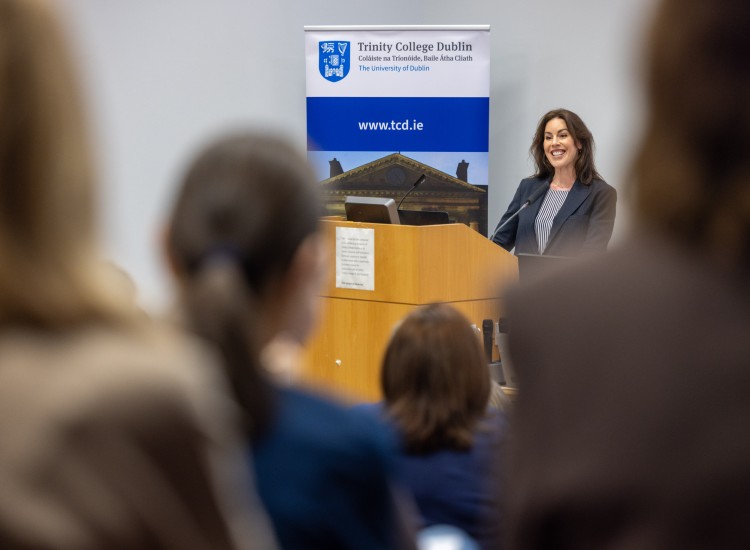 Minister for Health speaking at a podium