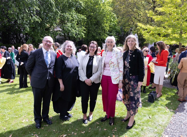 A group of people in a garden
