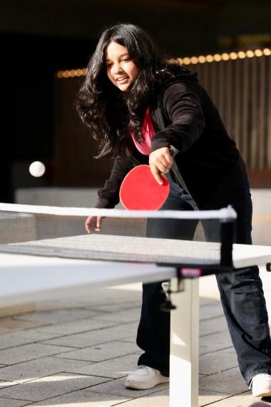 girl plays table tennis