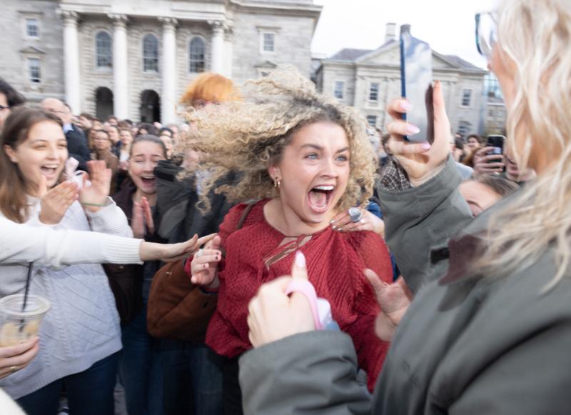 Sarah O'Connor, Dental Science, reacts to being announced as a new Scholar in Front Square
