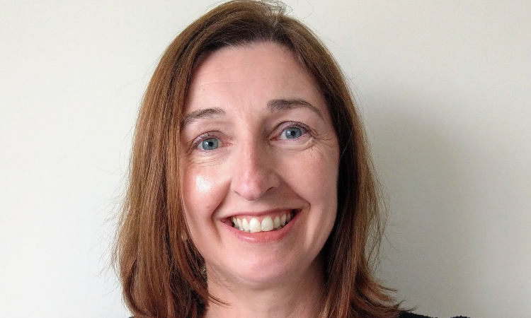 Headshot of Sinead Ryan Dean of Research
