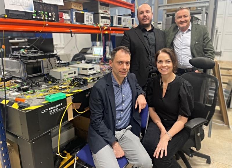 Sitting, Prof Marco Ruffini, Olivia Waters, and standing Prof Merim Dzaferagic, Declan McKibben.