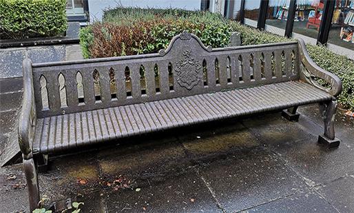 A beautiful, ornately carved bench made from Valentia Slate, now at Tralee Library.