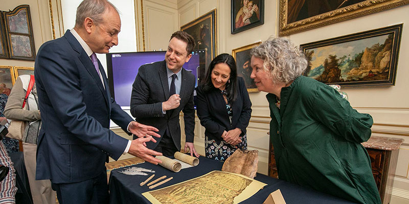 Taoiseach Micheál Martin with Dr Peter Crooks, Minister Catherine Martin and Provost Linda Doyle at the Virtual Record Treasury of Ireland launch