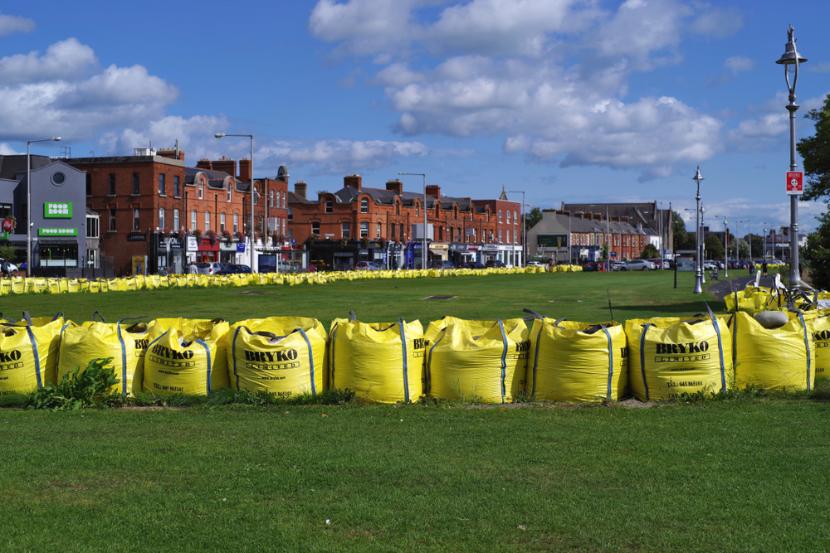 Large yellow sandbags as preventive flood protection in Clontarf, Dublin