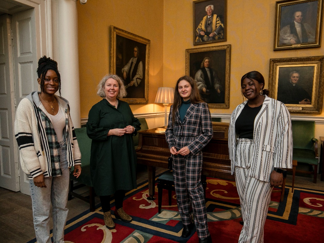 three students standing beside Provost Dr. Linda Doyle for winning the Prof John G. Byrne & Nóirín Plunkett Scholarship Awards