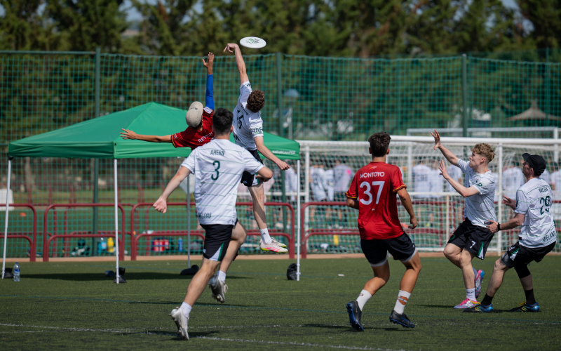 Hugh Dolan (15) elevates for the defensive play against the Spanish Opens Team, U24 Ultimate Frisbee World Championship 2025