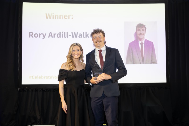 Trinity Sport Member of the Year Rory Ardill-Walker at Trinity Sport Awards 2025 with Hannah McGowan from Trinity Sport