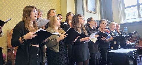 A choir singing at the launch of the Five Years of Public and Patient Involvement and Launch of National Impact Framework event
