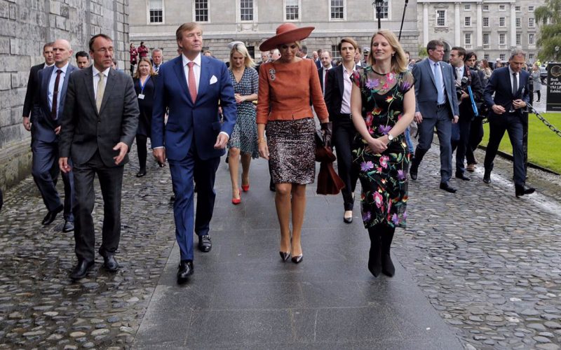 King Willem-Alexander and Queen Máxima of the Netherlands were joined by Trinity's Deputy President, Professor Chris Morash (left), and Head of Research Collections at Trinity Library, Laura Shanahan (right) en route to the Old Library to view the Book of Kells and the Fagel Collection.
