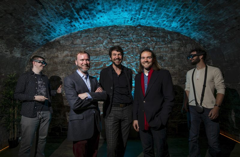 Guests put on headsets, embodied interrogators and explored the narrative by confronting Beckett’s characters in AR. Pictured above, in the centre and from left to right are Dr Neill O'Dwyer, Professor Aljosa Smolic, and Professor Nicholas Johnson.