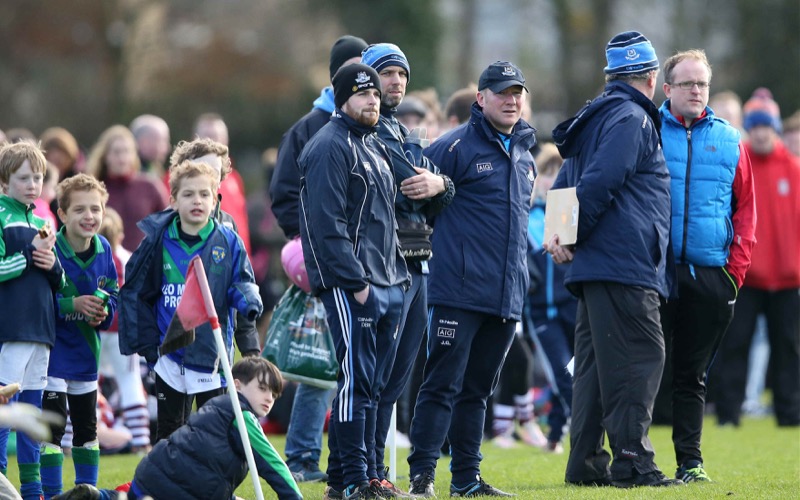 Dublin manager Jim Gavin watches from the sidelines as his team takes on Trinity men at the pitch opening in Santry