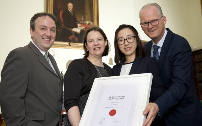 Dr Junsi Wang accepts her prize at the RIA.