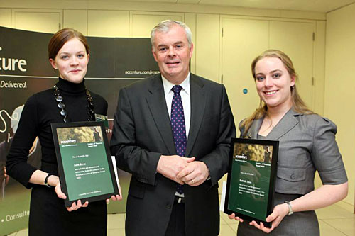 TCD students anne byrne and nathalie ennis winners of the best technology enabled solution award with accenture ireland representative.