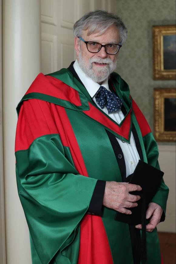 Man in graduation robes
