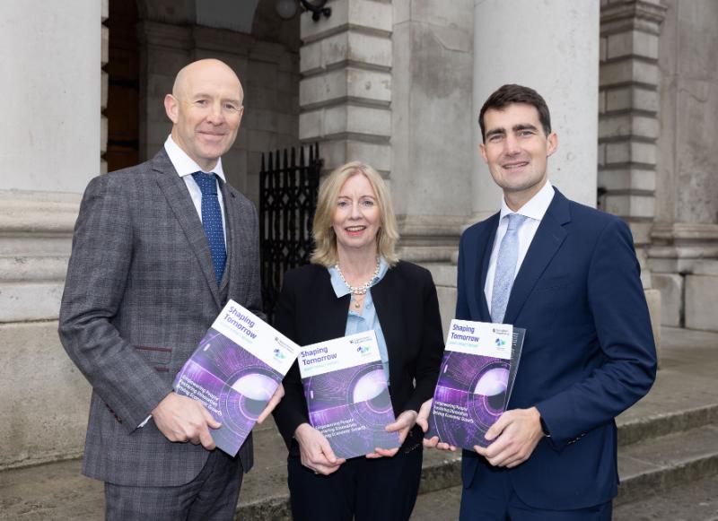 Professor John D Kelleher, Celine Fitzgerald and Minster Jack Chambers launch ADAPT's Impact Report in Trinity's Front Square.